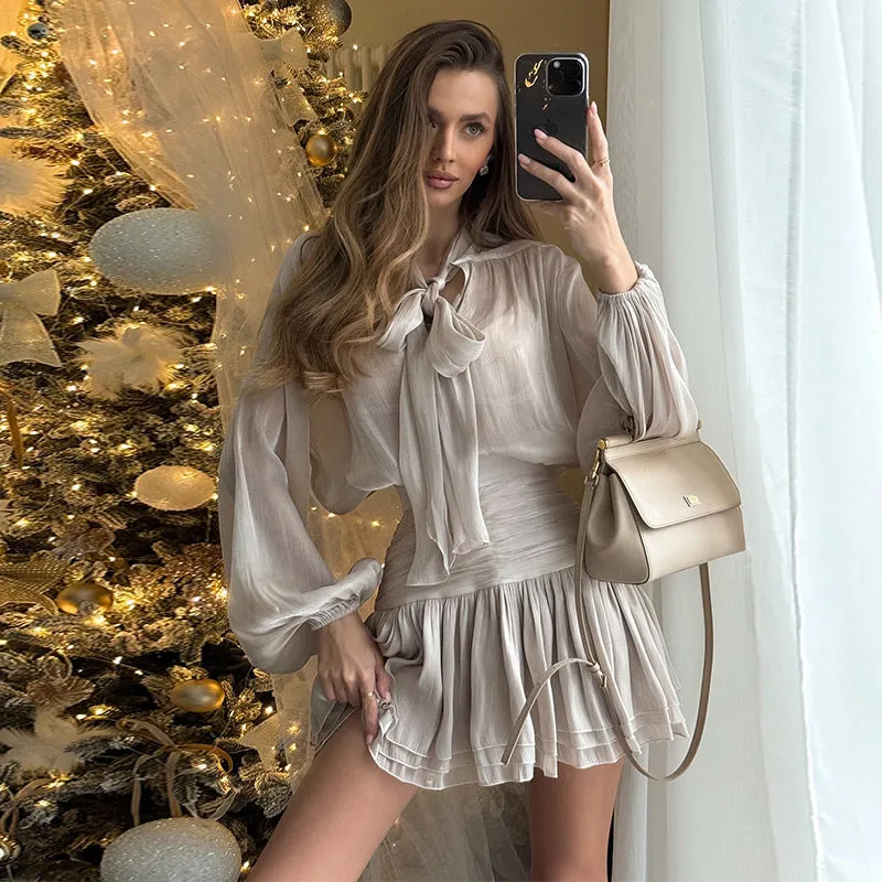 Elegant Sheer Bow-Tie Blouse and Pleated Skirt Two-Piece Set
